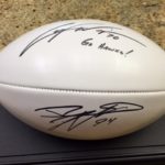 Jared DeVries and Casey Wiegmann Autographed football